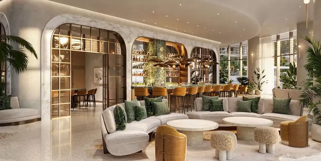 Residents lounge with marble arches, bar, and greenery