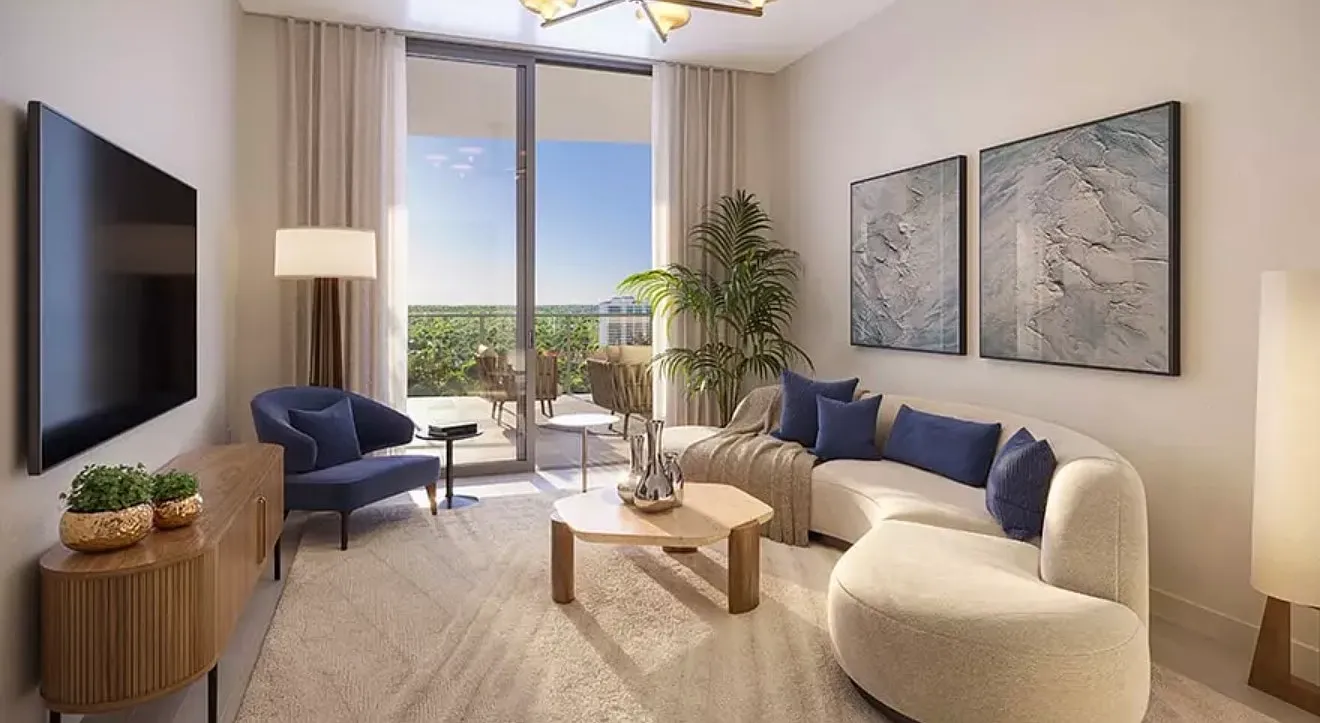 Living room with blue accents and balcony access