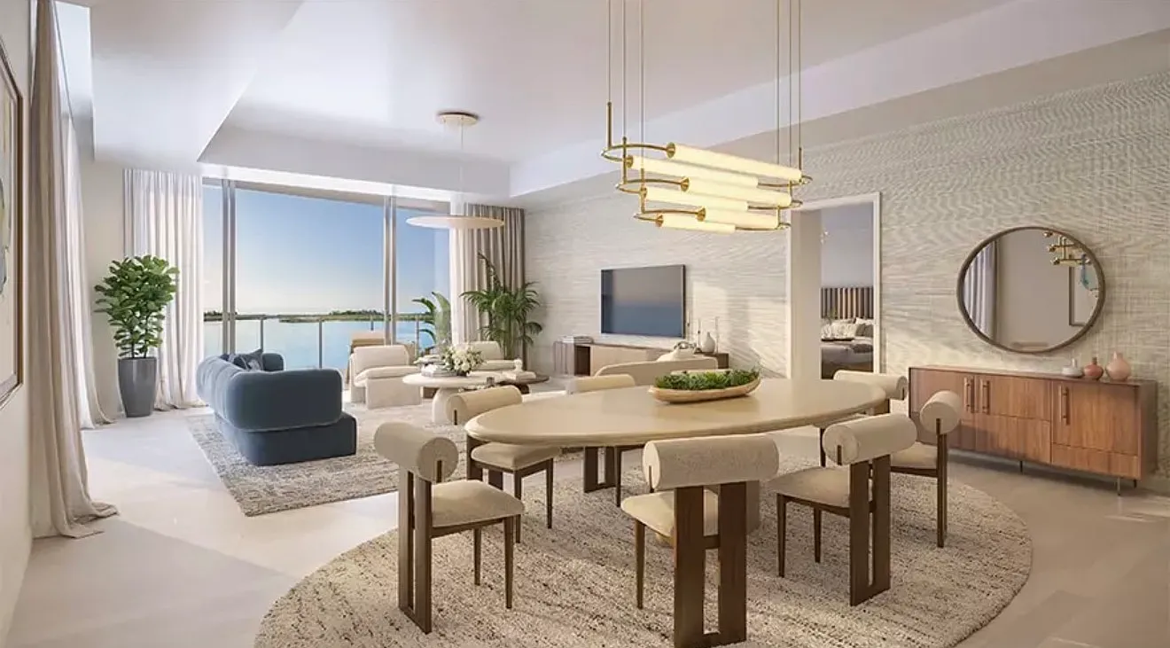 Open-concept dining and living area with panoramic water views